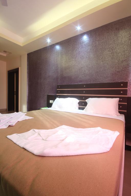 Urmee Hotel Bhuvanesvar Szoba fotó
