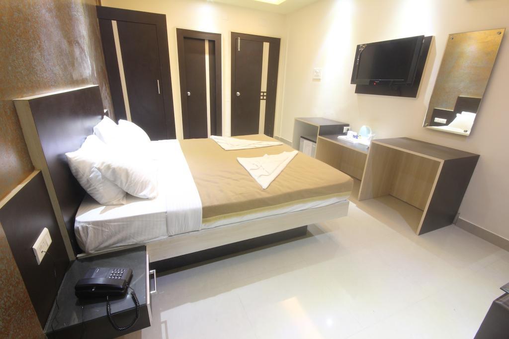 Urmee Hotel Bhuvanesvar Szoba fotó